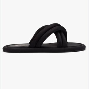Larroudé Cali flat mules in black Lycra